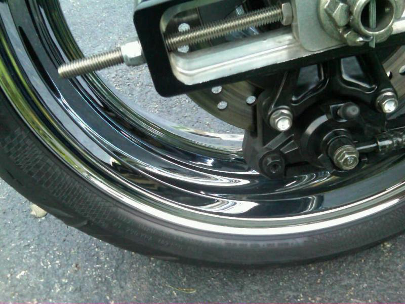 Spare parts from Myrtle West on a motorcycle wheel