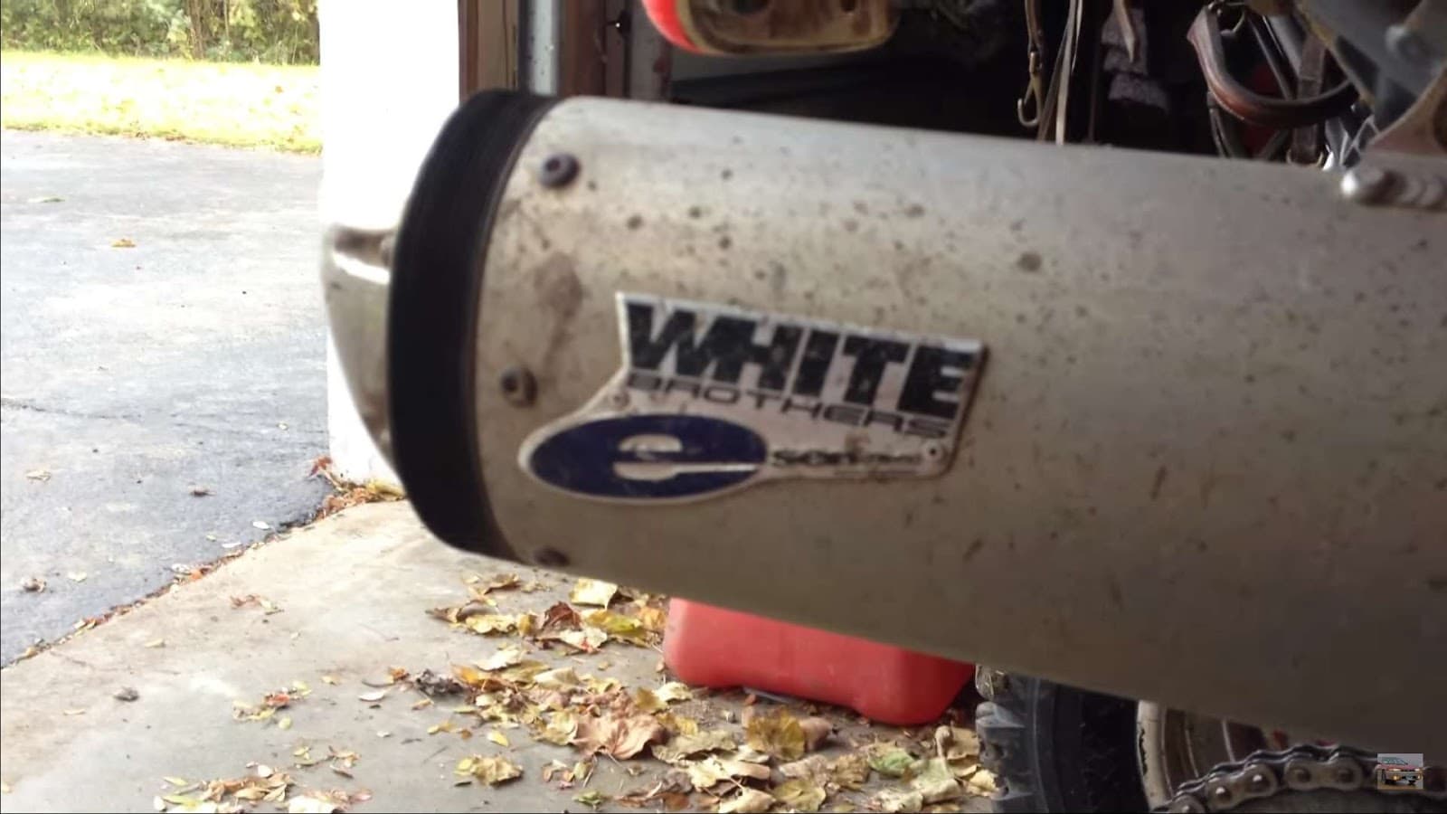Close up of white brother atv exhaust.